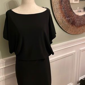 Whbm black dress 95% polyester 5% spandex w silver detailing on shoulder